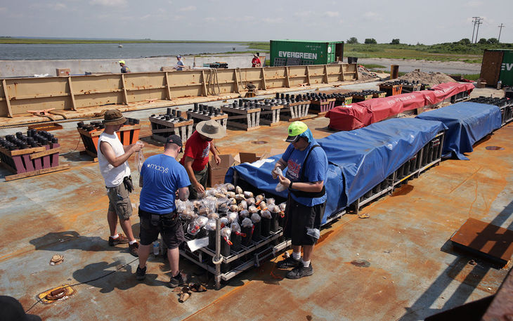 Workers prepare explosives, Wednesday July 1, 2015, on a barge full of fireworks in Brigantine. Pyro Spectaculars of Rialto, California is the contractor for the upcoming July 3 fireworks show in Atlantic City.