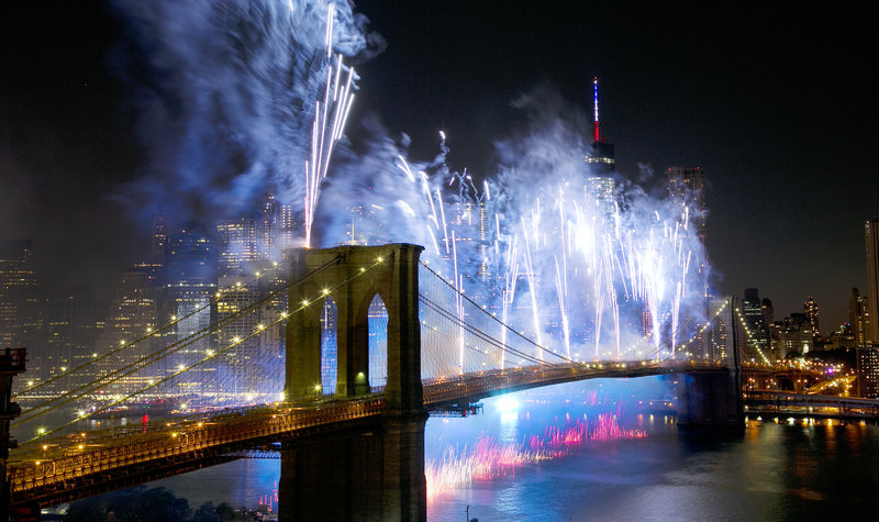 Fireworks light up the sky above the Brooklyn Bridge during Macy's 4th of July Fireworks Spectacular in 2014. Mark Lennihan/AP