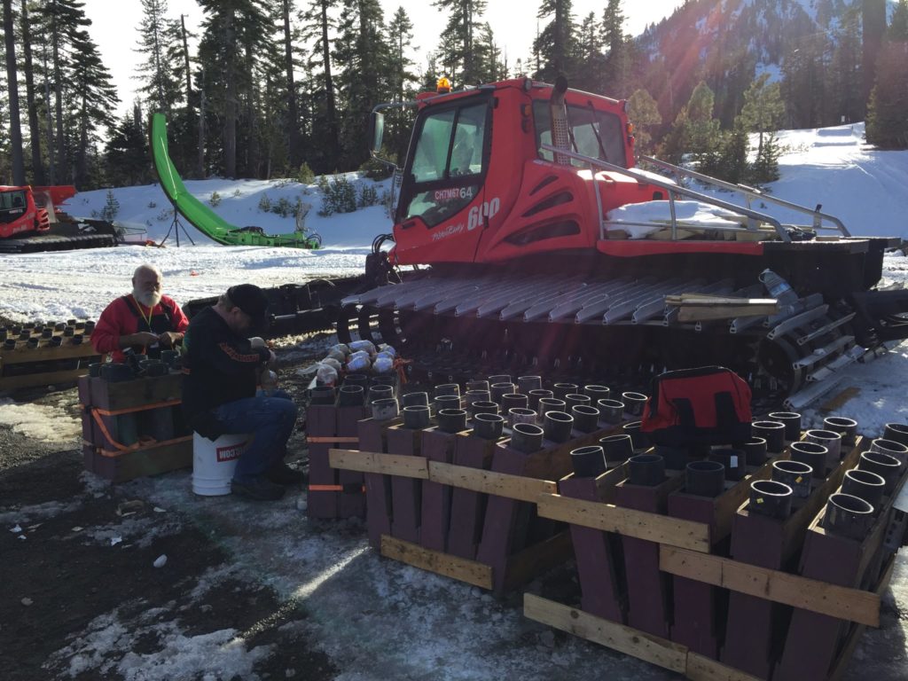 Moving the show up the mountain on the Snow cats.