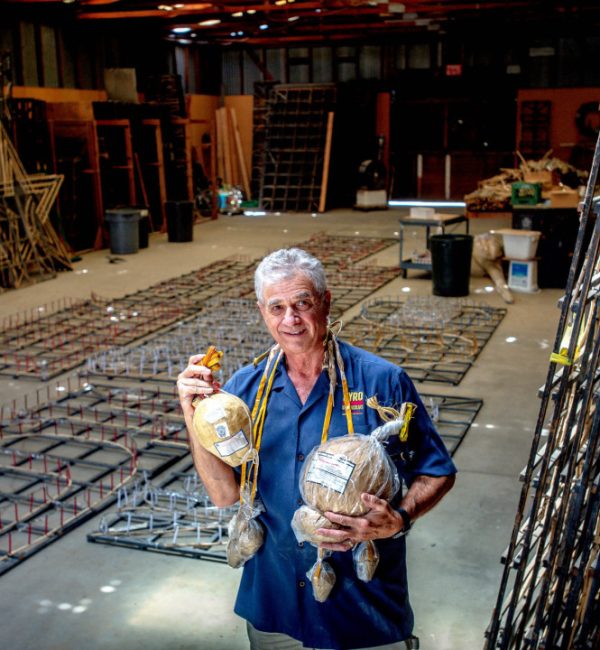 Pyro Spectaculars CEO Jim Souza holds different types of aerial firework shells inside a firework assembly building in Rialto on Thursday, June 17, 2021. (Photo by Watchara Phomicinda, The Press-Enterprise/SCNG)