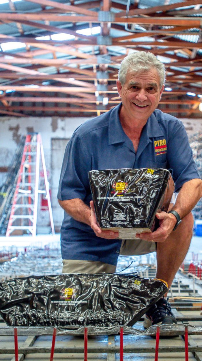 Pyro Spectaculars CEO Jim Souza shows different types of aerial firework shells inside a firework assembly building in Rialto on Thursday, June 17, 2021. (Photo by Watchara Phomicinda, The Press-Enterprise/SCNG)